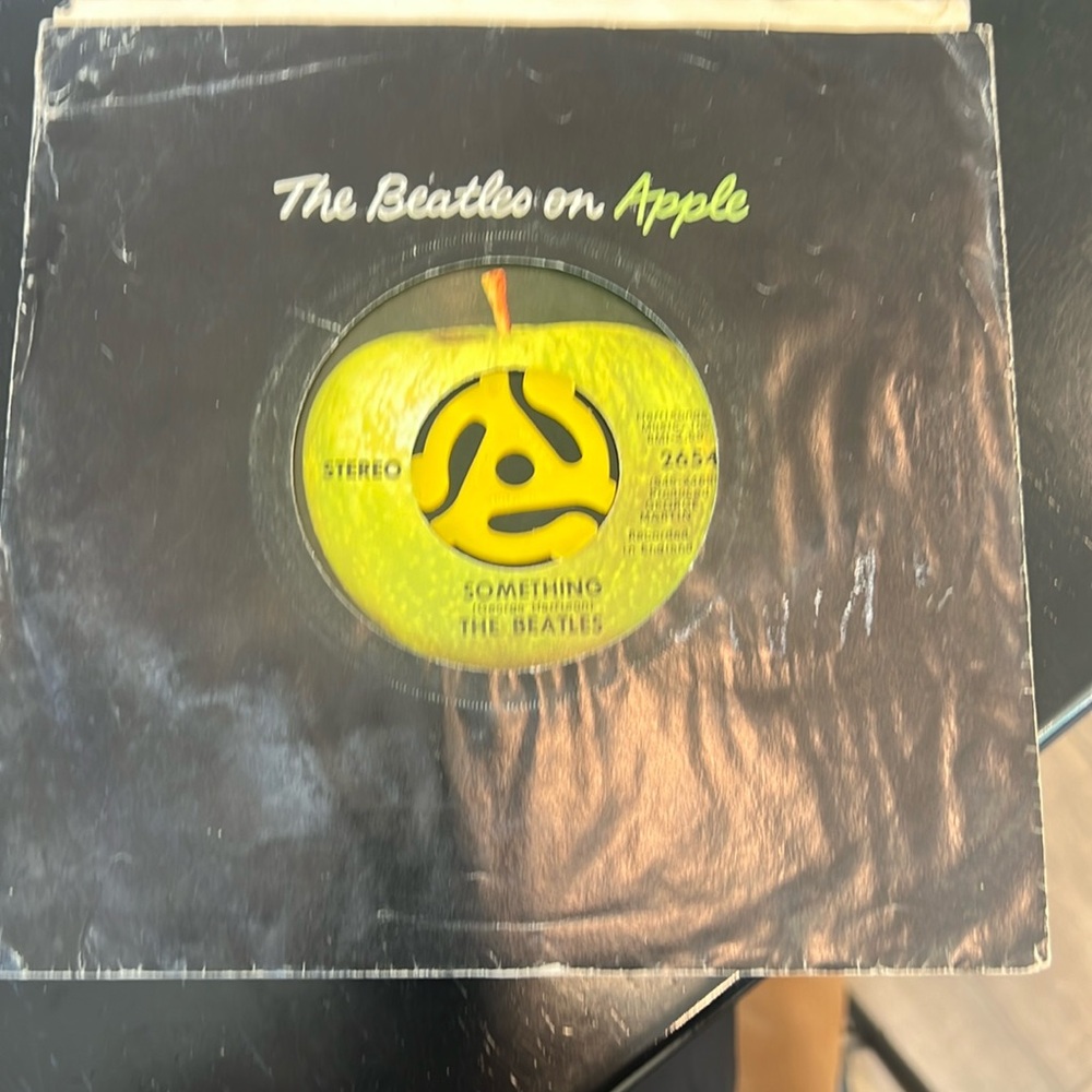 Beatles 45’ record “Something” & Come together 
With sleeve